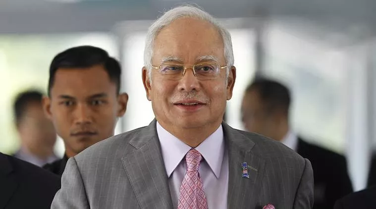 Police find $28m cash in raids linked to Malaysia ex-PM Najib - Sakshi