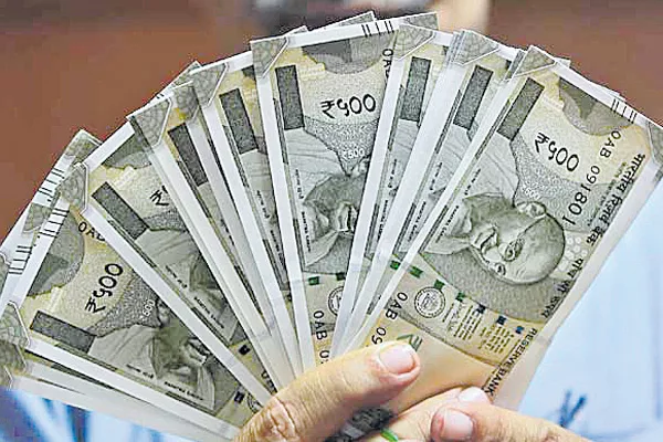 Rupee surges 56 paise vs dollar - Sakshi