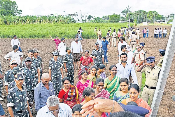 Govt Officials Over Action on Farmers - Sakshi