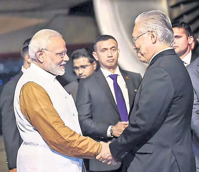 PM Modi leaves for Indonesia on three ASEAN nation tour - Sakshi