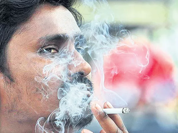 Tobacco aspect cancers in Telugu states is 35 thousand per year - Sakshi