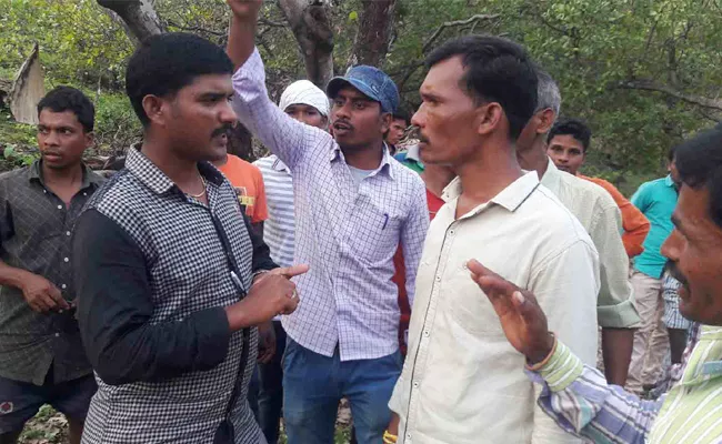 Tribal Youth Fires On Forest Department Officials - Sakshi