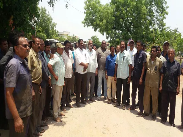 TMU Leaders Strike Infront Of Bus Bhavan In Nirmal - Sakshi