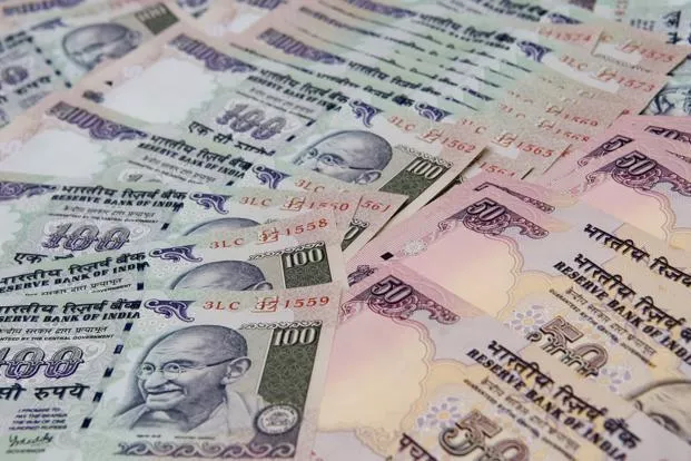 Rupee hits 15-month low against US dollar, bond yield slumps 13 bps - Sakshi