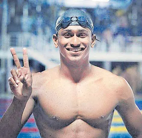 Sajan Prakash, Arvind Mani clinch seven medals for India  - Sakshi