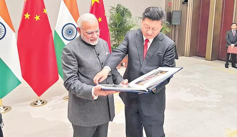 PM Modi in China for SCO Summit, to hold bilateral talks with Xi Jinping - Sakshi