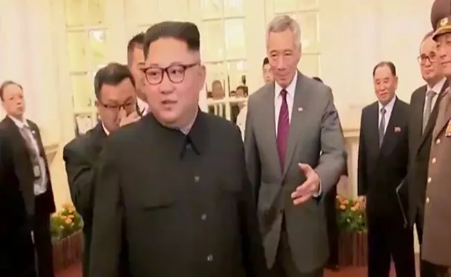 Kim Jong Un Gets Grand Welcome In Singapore - Sakshi