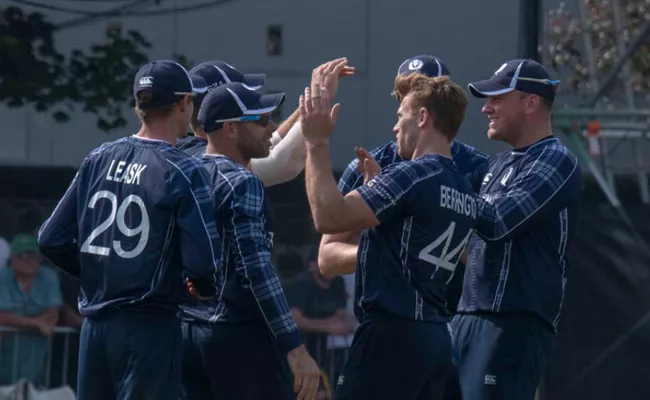 Scotland Win By 6 Runs Against England - Sakshi