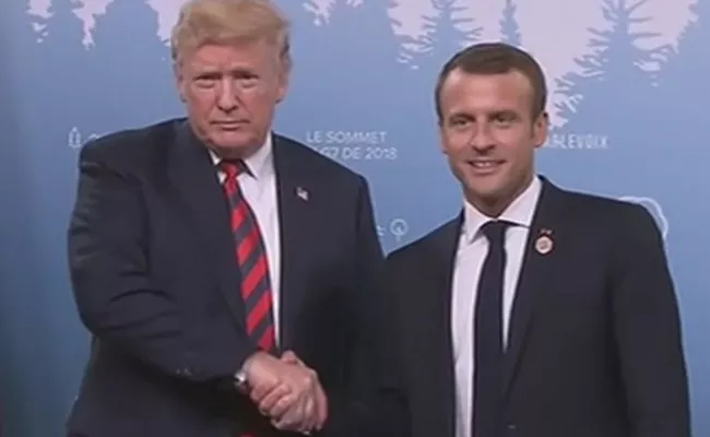 Trumps Hand Left With Thumbprint After Macron Handshake - Sakshi