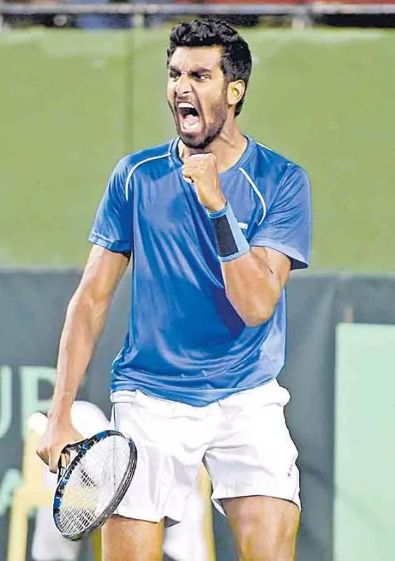 Prajnesh shocks Shapovalov in Stuttgart - Sakshi