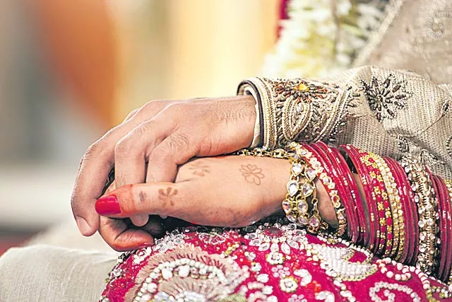 NRI Marriages Need To Be Registered Within 7 Days - Sakshi