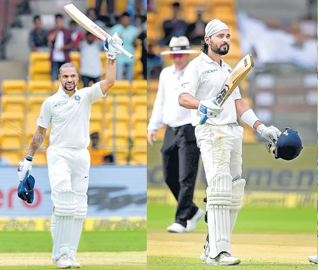 India scores 347 runs on opening day of the historic test match - Sakshi