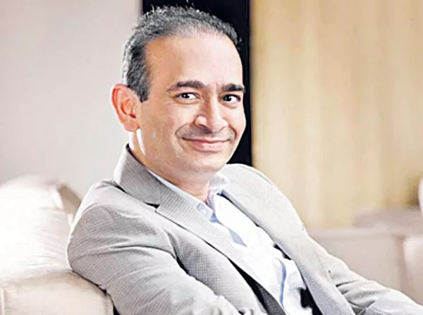 Nirav Modi managed to travel across several countries despite Interpol - Sakshi