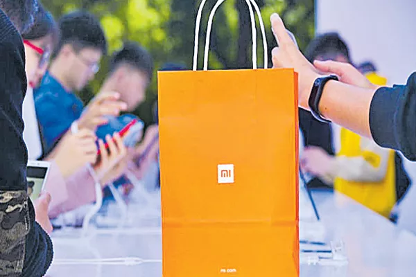 Xiaomi into digital loans - Sakshi