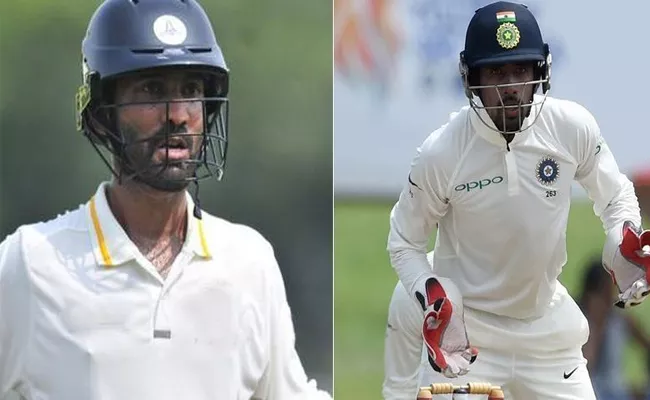 Dinesh Karthik Replaces The Injured Wriddhiman Saha for Afghanistan Test - Sakshi