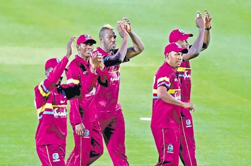 Evin Lewis leads the way as West Indies star in T20 fundraiser - Sakshi