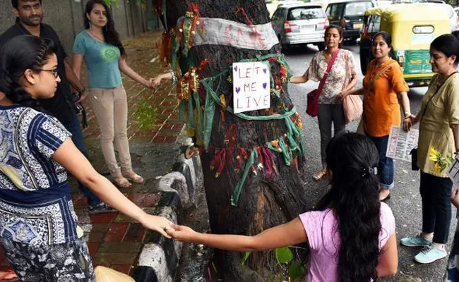 Chipko Movement To Save Trees In Delhi - Sakshi