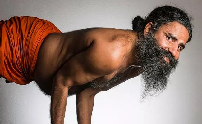 A Man Arrested For Sharing Morphed Photo To Defame Baba Ramdev - Sakshi