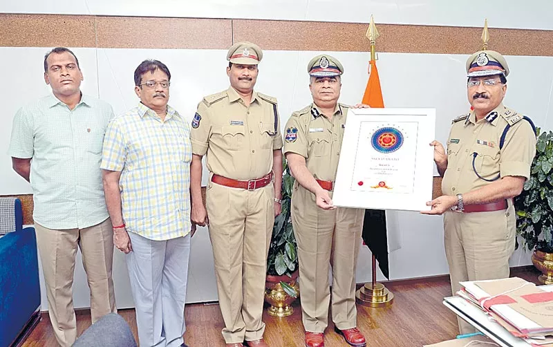 ts State Police Department win Skoch Silver Award - Sakshi