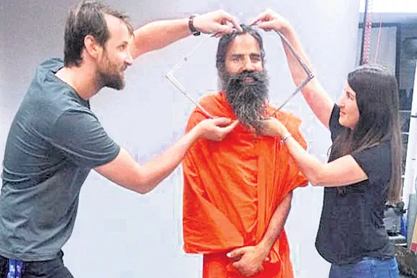 Baba Ramdev's wax statue in Madame Tussauds - Sakshi