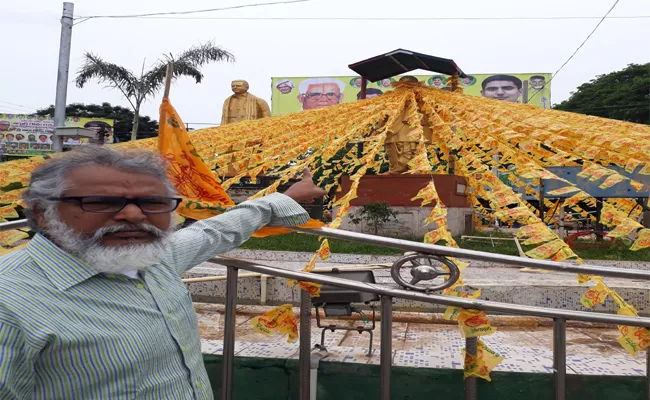 TDP Flags Around Prakasam Panthulu Statue In Krishna - Sakshi