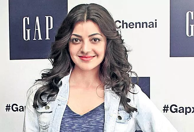 kajal agarwal relaxed for cooking - Sakshi