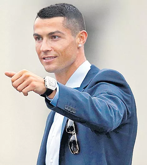 Cristiano Ronaldo hires STRONGMAN and MMA fighter after ISIS threats - Sakshi