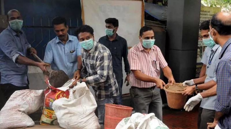 Doctor Performs Last Rites Of Those Killed By Nipah Virus - Sakshi