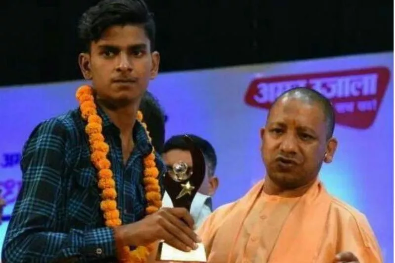 Student Pays Fine After Cheque Given By CM Yogi Adityanath Bounced - Sakshi