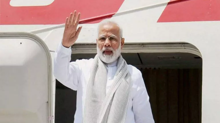 PM Modi Arrives In Qingdao Of China To Attend SCO Summit - Sakshi