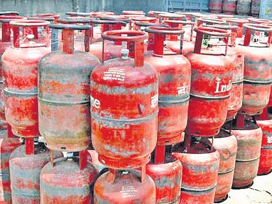 LPG price hiked by Rs 2.71 a cylinder - Sakshi