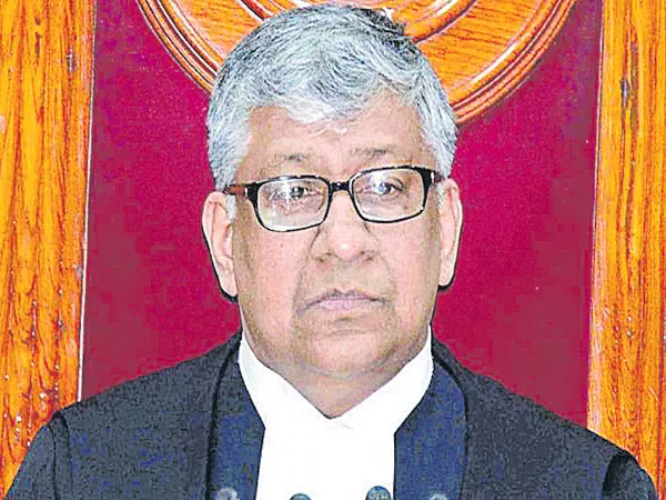 Justice Radhakrishnan clarification to advocates - Sakshi