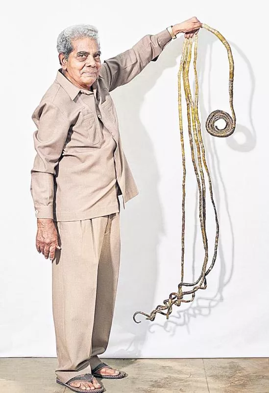 Pune man with longest fingernails to cut them after 66 years - Sakshi