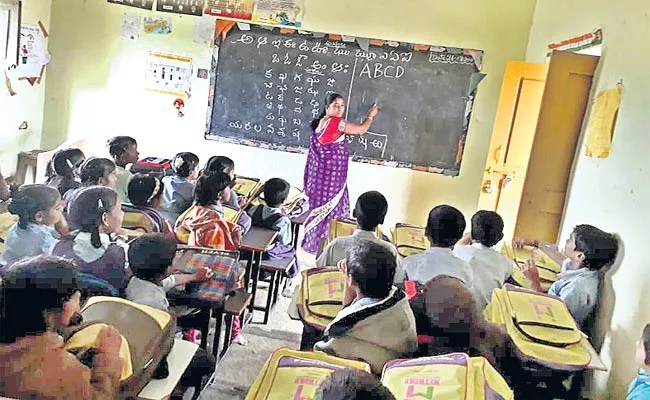 Sarpanch Teaching Lessons To The Students - Sakshi