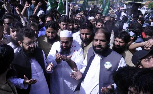 Terrorist Hafiz Saeed In Pakistan Election Campaign - Sakshi