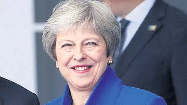 Theresa May says Donald Trump told her to sue the European Union - Sakshi