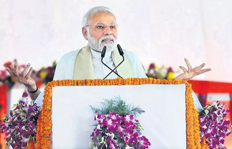 PM Narendra Modi targets opposition at Bansagar canal project  - Sakshi