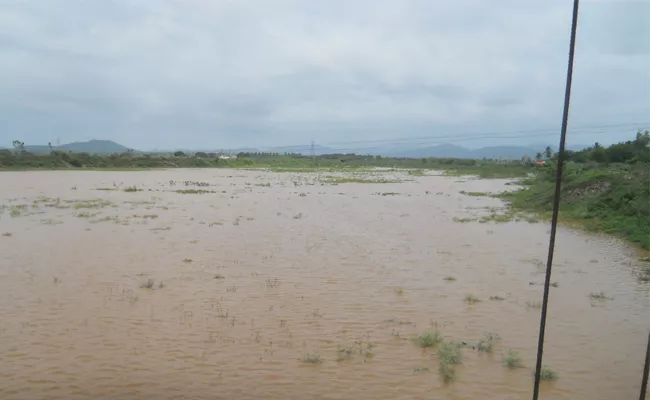 Hill Canals Flowing With Flood Water In West Godavari - Sakshi