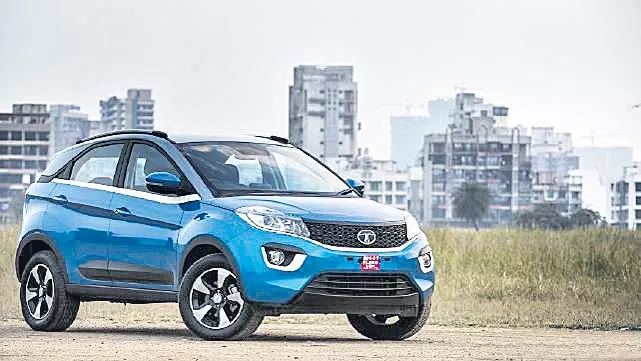 Tata Motors hikes vehicle prices - Sakshi