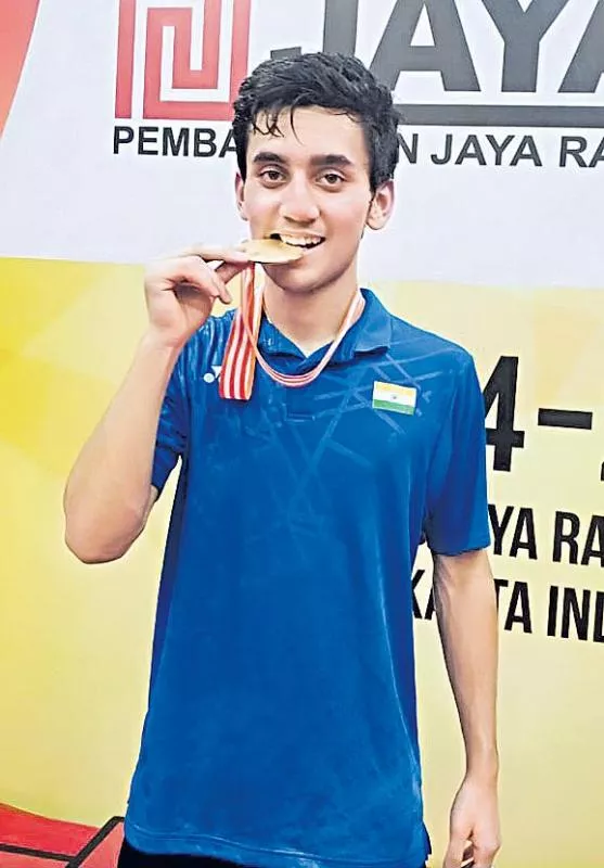 Lakshya Sen wins India's first men's singles gold in 53 years - Sakshi