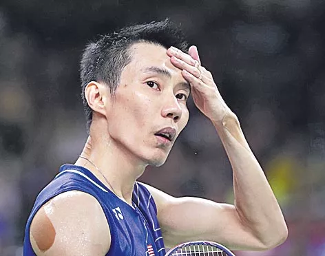 Lee Chong Wei pulls out of Badminton World Championships - Sakshi