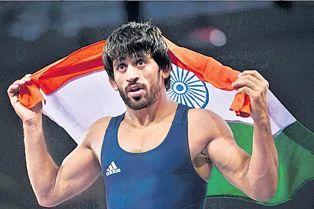 Wrestling: Bajrang Punia, Sandeep Tomar in final  - Sakshi