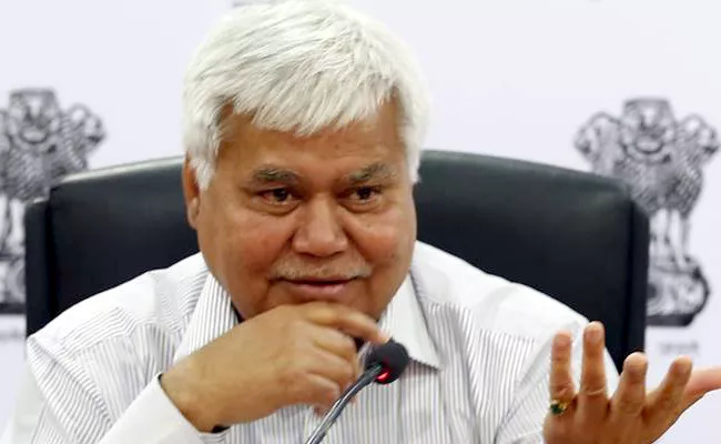 TRAI Chief Sharma tweets Aadhaar number, with a challenge - Sakshi