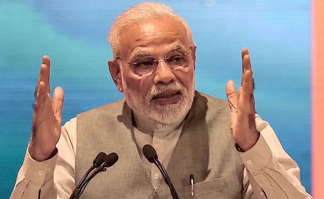 PM Modi Says Not Scared To Be Seen With industrialists - Sakshi