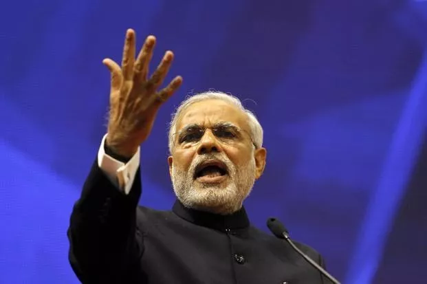 Narendra​ Modi says not afraid of being seen with industrialists - Sakshi