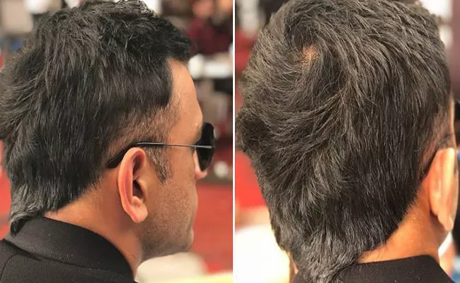 MS Dhoni sports trendy V Hawk hairstyle - Sakshi