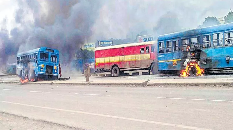 Police use tear gas to quell violent Maratha protests in western Maharashtra - Sakshi