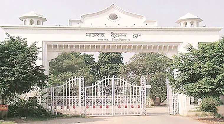 Lucknow Versity Denies Admission To Students For Waving Black Flags At CM Yogi - Sakshi