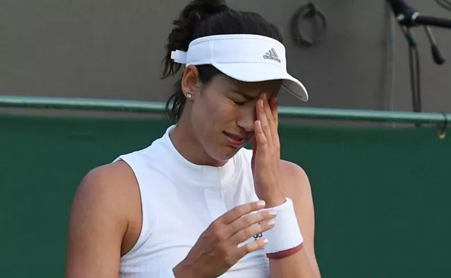 Defending Champion Garbine Muguruza Knocked Out As Seeds Scatter - Sakshi