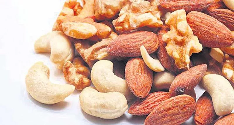 Buddy, pistachio, walnut, cashew nuts - Sakshi